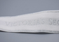 Pakaian Disesuaikan Pita Elastis Jacquard Putih 35mm Dengan Logo Perak Mengkilap